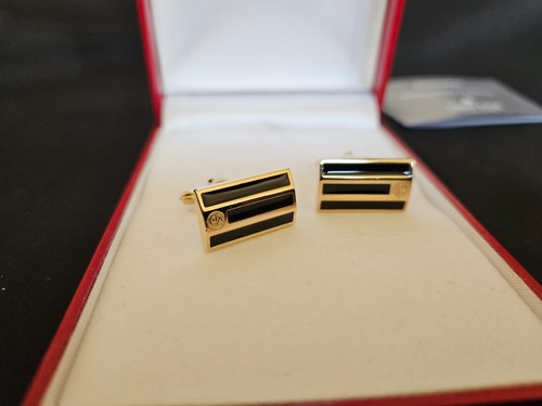 Boutons manchettes caran - de,