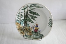 Ancien plat Art Populaire en faïence de Gien  " Femme aux fleurs  " 26 cm