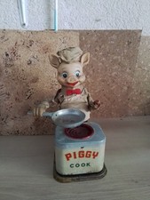 JOUET VINTAGE PIGGY COOK AUTOMATE. 1950. A REPARER 