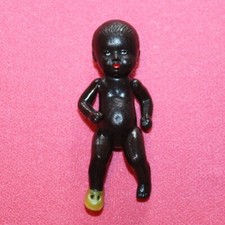 Ancien petit bébé / baigneur en celluloïd noir