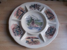 Grand plat rond à compartiments en faïence Obernai Sarreguemines Henri Loux