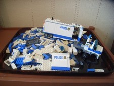 lot de lego  1,2kg en vrac  camion police te divers blanc et bleu