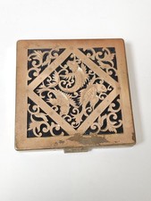 Poudrier ancien en métal