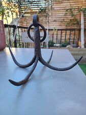 Crochet de feu en fer forgé