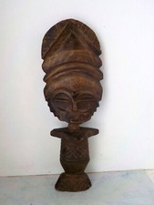 Originale petite poupée de