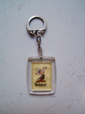 UDERZO / ASTERIX   / PORTE CLEF PUBLICITAIRE POUR ABSORBA  / ANNEE 60 