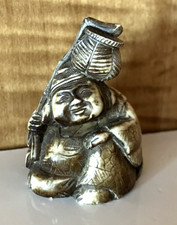 Carved resin MAN CARRYING