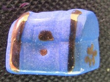 Fève Un coffre au trésors