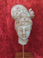 Chine grande tête femme