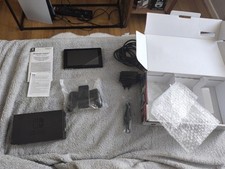 Nintendo Switch 32 Go Console Portable - Rouge Néon/Bleu Néon Sans Joycons 