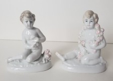 Paire de figurine d'enfants en