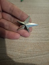 Broche «  étoile « THIERRY MUGLER tres bon état 