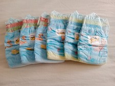6 couches de bain Huggies