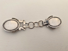 BOUCLE DE CAPE EN ARGENT