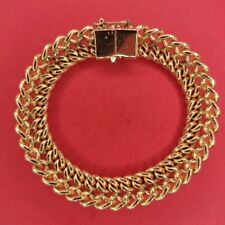 Gourmette maille américaine plaquée or jaune 18k avec poinçon.