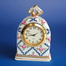 horloge miniature en fine porcelaine