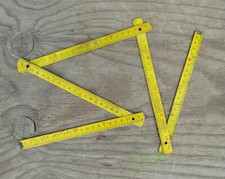 ancien mètre pliant en bois jaune