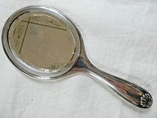 Miroir Face à main en métal argenté Wiskemann (Belge) décor de coquilles