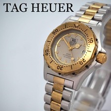 Montre femme TAG Heuer série 3000 lunette dorée cadran gris 934 208 fonctionne