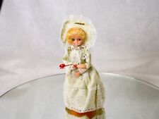 Poupée boîte à musique avec