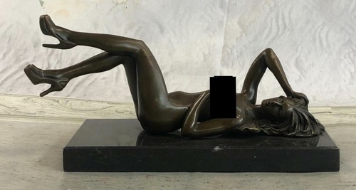 Signé mavchi bronze - signé:,
