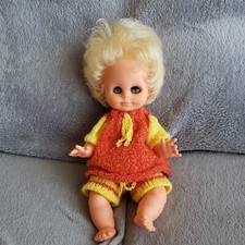 poupon ARI 3397 dans le dos de