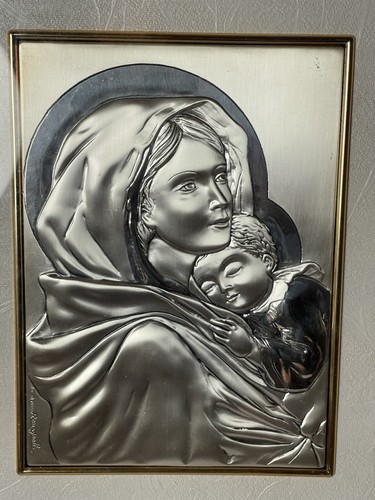 Bas relief vierge - vierge, À