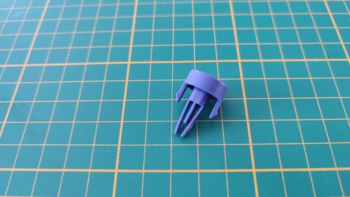 Bouton reset violet pièce