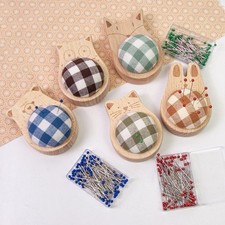 Pin de couture Coussin