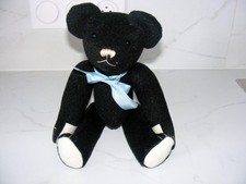 Ours brun remplis de paille en très bon état hauteur33cm