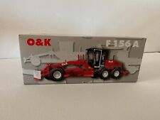 Niveleuse O&K en 1/50 rouge en occasion bonne état Emballage D'Origine