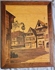Grand cadre avec marqueterie Rue de village d' Alsace avec enseigne fer forgé