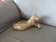 ancienne figurine loutre et