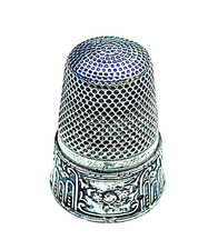 Dé à coudre ancien en argent massif.