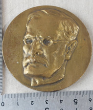 Ancienne médaille en bronze