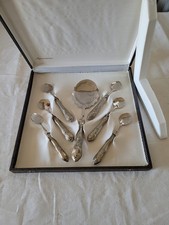 Coffret service cuillères métal argenté à 800.