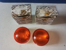 2 cabochons oranges neufs
