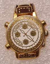 pin's montre SEIKO Marron Roland Garros- Arthus Bertrand - tennis - émail grand-