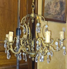 Lustre bronze doré style Louis XV feuillagé 6 bras 42 pampilles cristal facetté