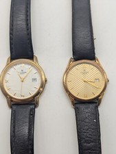 lot 2 montres Clyda Paris, doré, date à 3h, une plaqué or 23k électro plated