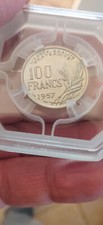   Pièce de 100 francs cochet 1957 coque GENI MS63