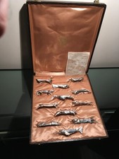 orfévrerie gallia.12 porte couteaux animaux métal argenté art déco anciens