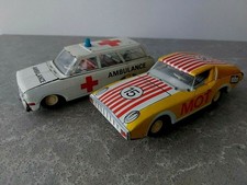 Lot de 2 voitures jouets vintage en étain fabriquées en Allemagne