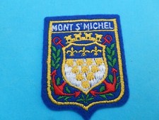 ECUSSON  TISSU  BRODE  MONT SAINT MICHEL ANCRE LYS COQUILLES