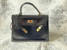 sac Hermès Kelly rigide vintage cuir box noir 27 cm
