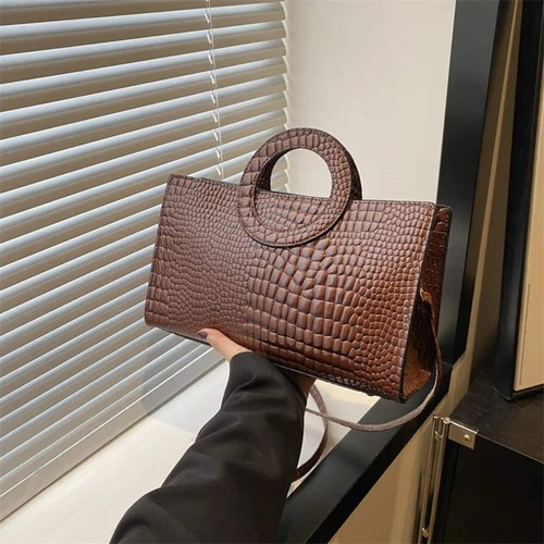Sac main crocodile chic - main,