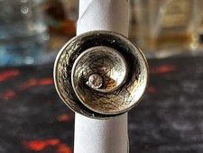 NEUVE TRÈS BELLE BAGUE ARGENT ÉLASTIQUE ORIGINALE TOURBILLON ET ZIRCON AU CENTRE