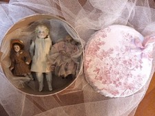 Joli trio de poupées