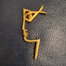 Broche, Le visage, Jean