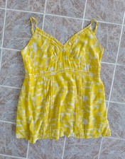 (A) Top jaune en Soie marque